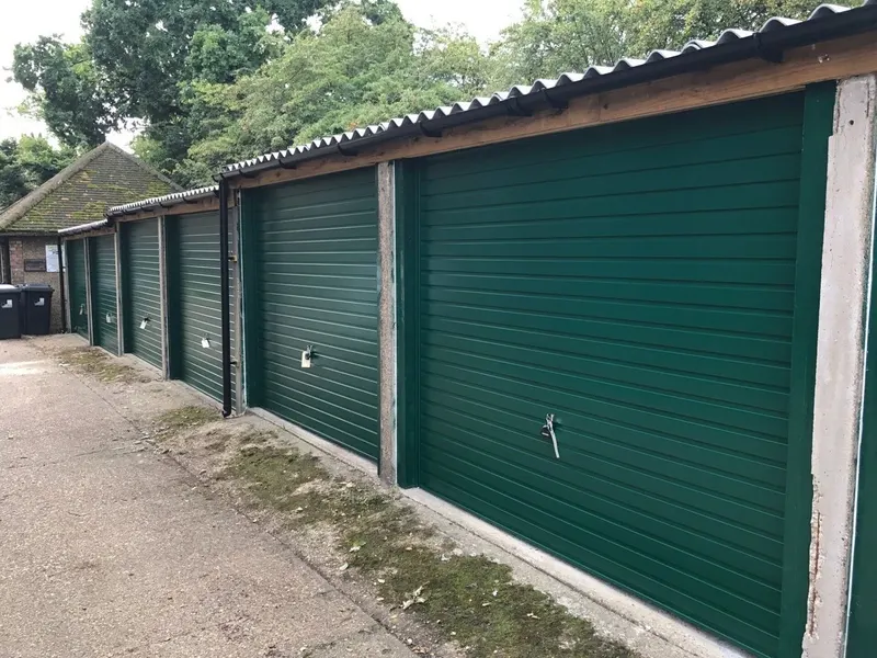 Up and over garage door fitted to a brick garage in Twickenham